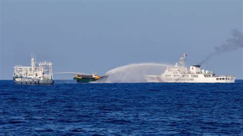 Beijing and Manila strike deal to reduce tensions in  .